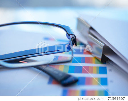 Business image, graph, glasses, documents Business image, graph, glasses, documents 71561607