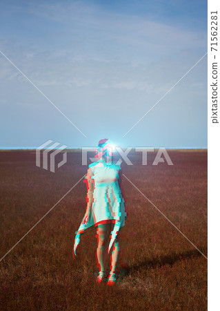 Woman goes into virtual reality using virtual reality headset. Image with glitch effect. Woman goes into virtual reality using virtual reality headset. Image with glitch effect. 71562281