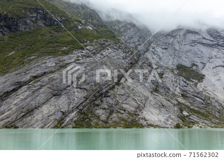 Norway mountains landscape view near lake glacier Norway mountains landscape view near lake glacier 71562302