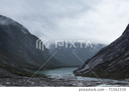 Norway mountains valley landscape cold cloudy view Norway mountains valley landscape cold cloudy view 71562339
