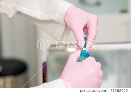 Blood collection system in hands. Blood collection system in hands. 71562435