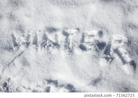 Snow text word on white sunny winter mood day Snow text word on white sunny winter mood day 71562725