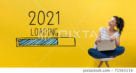 Loading new year 2021 with woman using a laptop Loading new year 2021 with woman using a laptop 71563119