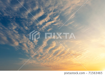 Dramatic colorful red purple to blue sunset or sunrise sky landscape. Natural beautiful cloudscape dawn background wallpaper. Stormy windy nature twilight dusk scene panorama Dramatic colorful red purple to blue sunset or sunrise sky landscape. Natural beautiful cloudscape dawn background wallpaper. Stormy windy nature twilight dusk scene panorama 71563465