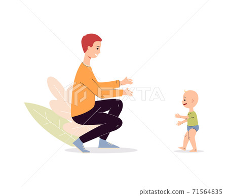 Baby first steps - adult father looking at toddler child walking and smiling. 71564835