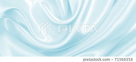 Smooth elegant blue silk or satin luxury cloth texture as abstract background. Luxurious background design Smooth elegant blue silk or satin luxury cloth texture as abstract background. Luxurious background design 71568358
