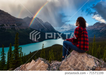 Girl enjoying Canadian Nature Landscape Girl enjoying Canadian Nature Landscape 71571199
