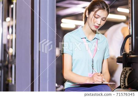 Woman gym trainer Woman gym trainer 71576345