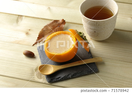 Persimmon pudding and tea using one whole persimmon Persimmon pudding and tea using one whole persimmon 71578942