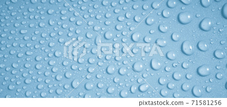 Water drops on blue background 71581256