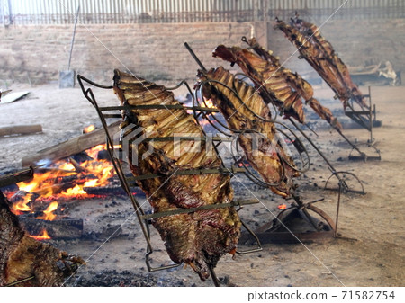 rib roast to the stake typical Argentine food rib roast to the stake typical Argentine food 71582754