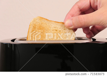 Close up of toaster with two slices of toast 71583873