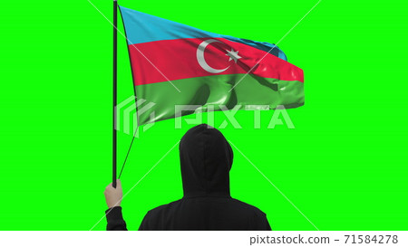 Waving flag of Azerbaijan and unknown man wearing black, isolated on green background Waving flag of Azerbaijan and unknown man wearing black, isolated on green background 71584278