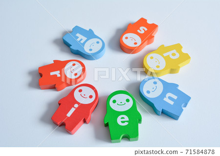 "Friends" made from domino pieces with the alphabet printed on them 71584878