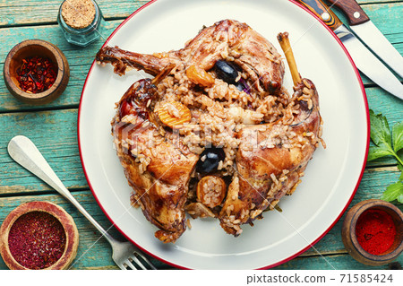 Delicious risotto with rabbit. Delicious risotto with rabbit. 71585424