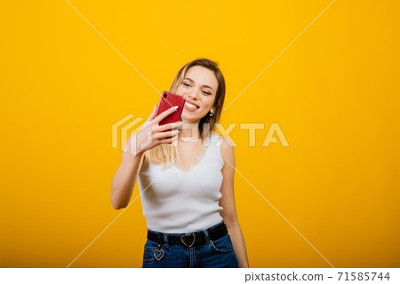 Headshot of happy emotional woman laughing from the bottom of her heart Headshot of happy emotional woman laughing from the bottom of her heart 71585744