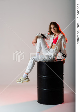 Teenage female dancing hip-hop in studio, casual clothes 71585833