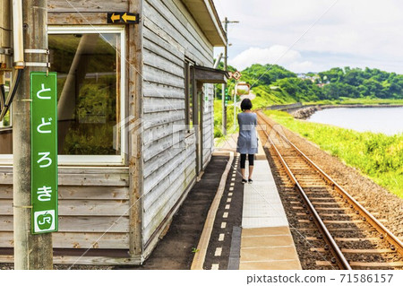Blue sky and summer Todoroki station, one woman waiting for the train, Fukaura Town, Aomori Prefecture Blue sky and summer Todoroki station, one woman waiting for the train, Fukaura Town, Aomori Prefecture 71586157