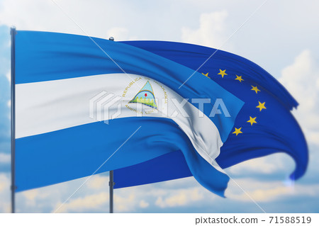 Waving European Union flag and flag of Nicaragua. Closeup view, 3D illustration. 71588519