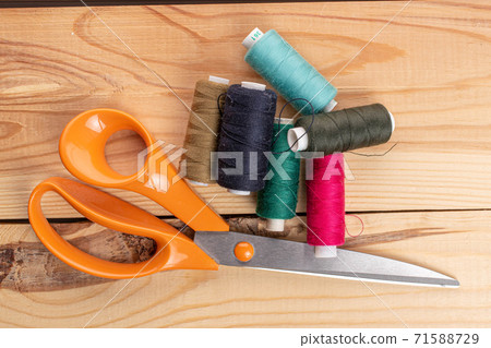 Haberdashery item on wood Haberdashery item on wood 71588729