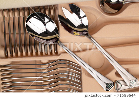 Steel cutlery on box 71589644