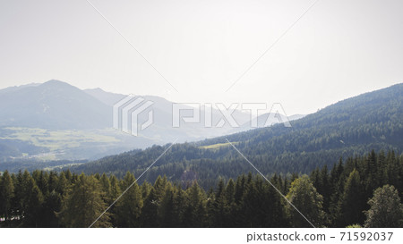Sunny summer day with blue skies in Muttereralm, one of the mountains of the Austrian alps. Sunny summer day with blue skies in Muttereralm, one of the mountains of the Austrian alps. 71592037