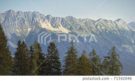 Sunny summer day with blue skies in Muttereralm, one of the mountains of the Austrian alps. Sunny summer day with blue skies in Muttereralm, one of the mountains of the Austrian alps. 71592046