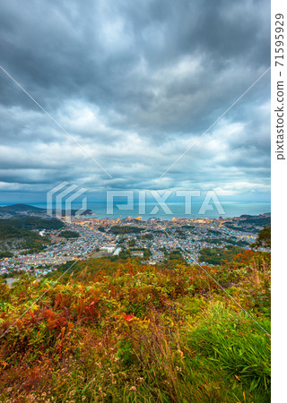 Otaru, Hokkaido, Japan town cityscape over Ishikari Bay Otaru, Hokkaido, Japan town cityscape over Ishikari Bay 71595929