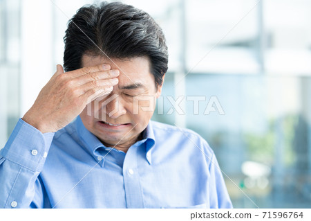 Middle-aged man crying 71596764