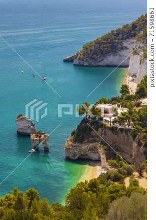 Zagare beach near Faraglioni di Puglia, National park Gargano, Apulia, Italy Zagare beach near Faraglioni di Puglia, National park Gargano, Apulia, Italy 71598661