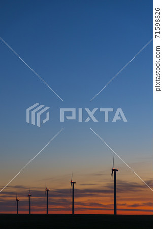 Wind turbines during sunrise, Southern Moravia, Czech Republic Wind turbines during sunrise, Southern Moravia, Czech Republic 71598826