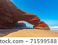 Red arches of Legzira beach, Morocco. 71599588