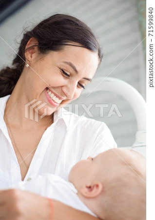 Mother and Baby playing and hugging. Happy Family Mother and Baby playing and hugging. Happy Family 71599840