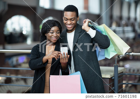 Super sale in stores in mall during Black Friday and autumn seasonal sale 71601198