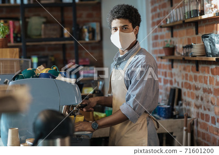 Social distance, new normal, ordering coffee to go and modern barista work Social distance, new normal, ordering coffee to go and modern barista work 71601200
