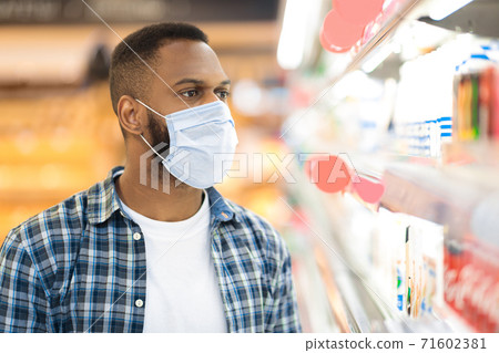 Supermarket Consumer's Portrait, African Man Wearing Mask Doing Grocery Shopping 71602381