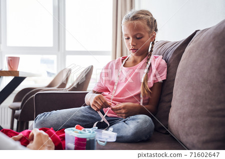 Girl with measuring type on her neck Girl with measuring type on her neck 71602647