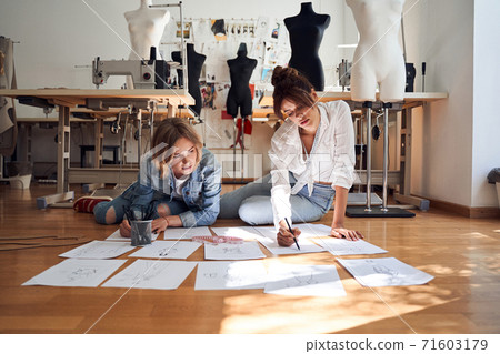 Designer creating sketches Designer creating sketches 71603179
