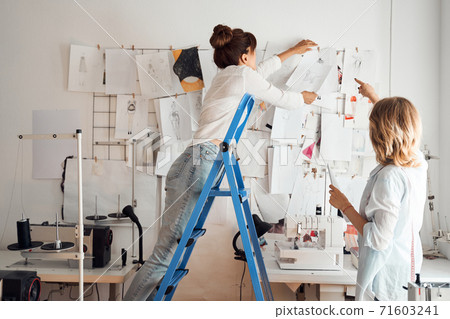Designer choosing place for sketch Designer choosing place for sketch 71603241