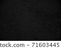 Abstract black background of textured wall 71603445