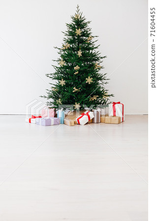 Christmas tree with decorations and gifts New Year holiday Christmas tree with decorations and gifts New Year holiday 71604455