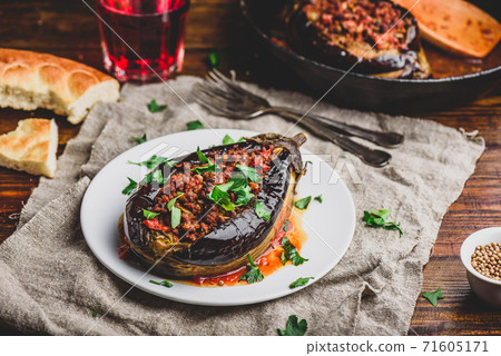 Eggplant stuffed with ground beef and tomatoes 71605171