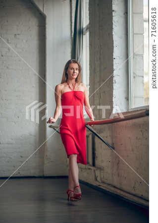 Young woman having a classical dance class Young woman having a classical dance class 71605618