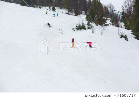 People are trained to ski. People are trained to ski. 71605717