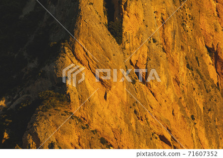 Mountains of the Mallos de Riglos at sunset, pre-Pyrenees, Aragon, Spain. Mountains of the Mallos de Riglos at sunset, pre-Pyrenees, Aragon, Spain. 71607352