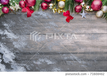 Christmas ornaments and decorations on wooden table Christmas ornaments and decorations on wooden table 71608482