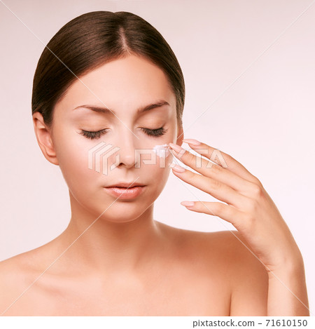 Sunscreen skin cream woman. Skincare tan girl. Cancer damage 71610150