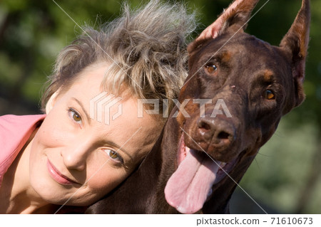 Woman with dog Woman with dog 71610673
