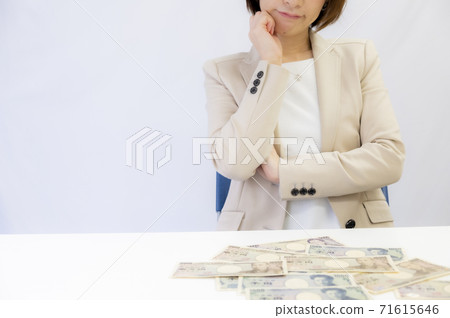 Women worried about how to spend money [2020 71615646