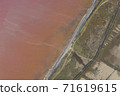 High angle drone view of pink lake where salt is extracted, Sasyk Sivash lake in Crimea High angle drone view of pink lake where salt is extracted, Sasyk Sivash lake in Crimea 71619615